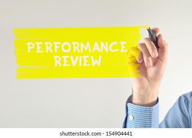 Business Performance Review. Businessman Writing Note With Marker Pen.