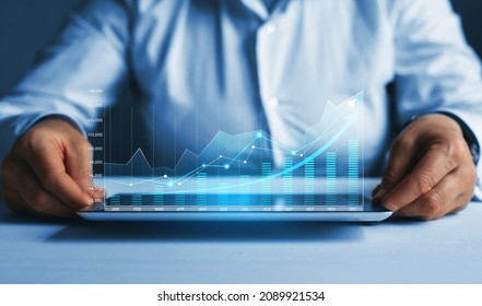 Business person analyzing financial annual statistics displayed on virtual  screen. Infographic annual statistics.
Growth the company's annual revenue to success. - Shutterstock ID 2089921534