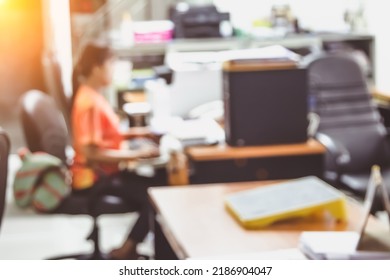 Business Person Blur In The Workplace At Sitting On A Computer Screen Work Space On Table Desk Work In Office Blurry, Document Division And People Shallow Depth Of Focus Horizontal Abstract Interior.