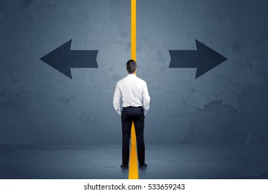 Business Person Choosing Between Two Options Separated By A Yellow Border Arrow Concept