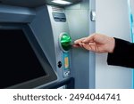 Business, person and hand with credit card at ATM for check account balance, withdraw cash and deposit funds. People, closeup and machine for banking or transaction and utility payments or service.