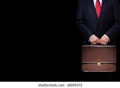 business person holding a briefcase