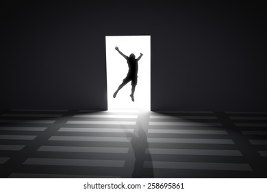 Business person looking at wall with light tunnel opening concept - Powered by Shutterstock