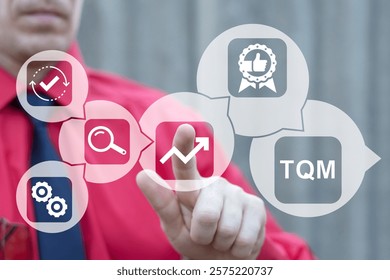 Business person using virtual touch screen clicks text: TQM. TQM Total Quality Management Business Concept. Management approach to long-term success through customer satisfaction and sustainability.