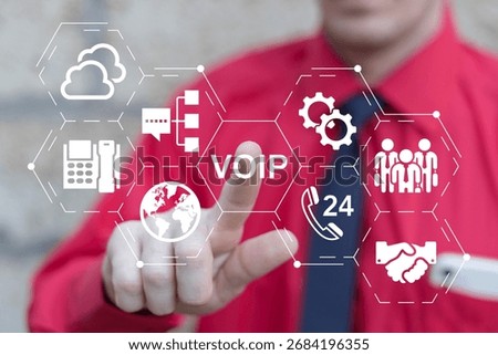 Business person using virtual touch screen presses the acronym VOIP. VOIP Telecommunication Technology concept. IP telephone and connection line.