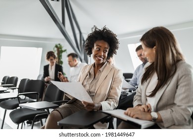 Business persons, sitting and discussing about new plans. - Shutterstock ID 1981449647