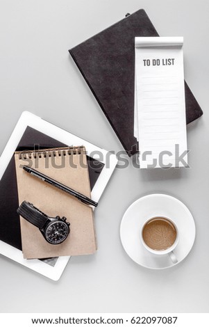 business plan development with notebook and coffee desk background top view mockup