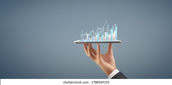 Business Plan Graph Growth And Increase Of Chart Positive Indicators In His Business, Tablet In Hand