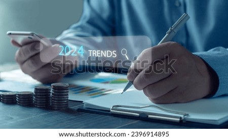 Business planning and strategic concept. Businessman planning business with trends 2024 icons, investment funds, stock returns 2024, new investment plan, financial economic analysis, success strategy