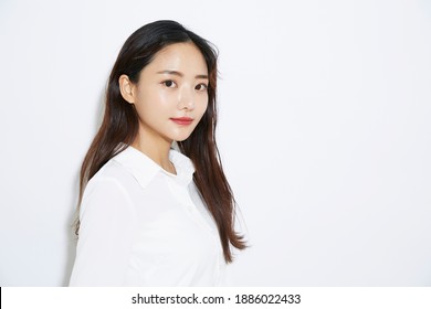 Business Portrait Of Asian Young Slender Woman