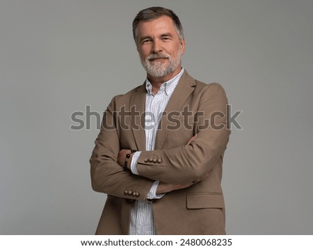 Business portrait of confident businessman. Entrepreneur in stylish jacket smiling, Happy mid adult, mature age man standing, smiling