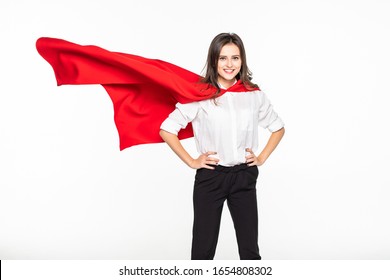 business, power, success, achievement and people concept - young smiling businesswoman in red superhero cape holding raised fists