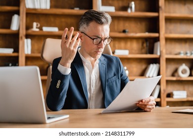 Business Problems With Work, Clients. Debt, Loan, Mortgage Issues, Divorce Document. Caucasian Sad Angry Shocked Businessman Lawyer Boss Ceo Doing Paperwork In Office