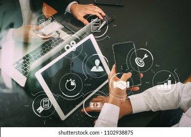Business process management with workflow automation diagram and gears in virtual flowchart.co working team meeting concept,businessman using smart phone and digital tablet and laptop computer.
