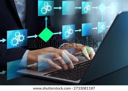 Business process optimization. Workflow improvement and task automation. Businessman using automated system on laptop computer to improve operational efficiency.