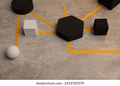 Business process organization and optimization. Scheme with geometric figures on grey table