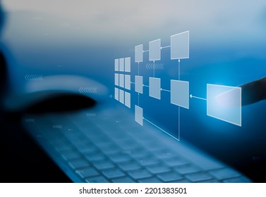 Business process and workflow automation with flowchart, businessman in background - Shutterstock ID 2201383501