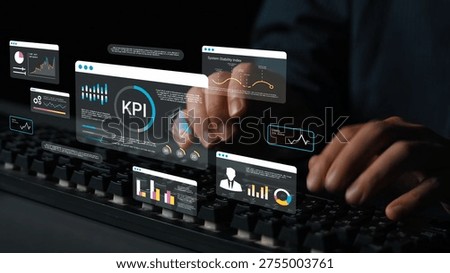 Business professional analyzing data through interactive dashboards and graphs while working on a keyboard in a dark office environment for better performance evaluation Gluon.