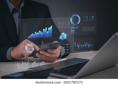 A business professional analyzing financial data on a mobile device with visualized graphs and statistics on a digital screen, demonstrating business intelligence and digital transformation.