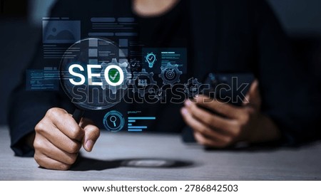 Business professional analyzing SEO optimization and digital marketing strategy with search engine analytics, keyword research, and online performance management technology.