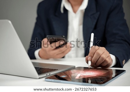 Business professional coding AI program on tablet with pen, integrating smartphone and laptop for innovation, big data, and digital transformation technology hacker cyber security concept.