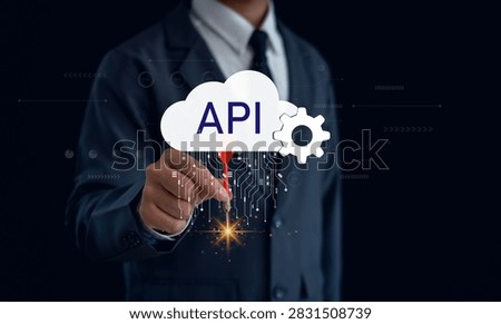 Business professional developing cloud API integration for digital transformation, software development, system connectivity, data exchange, automation, enterprise applications, scalable technology.