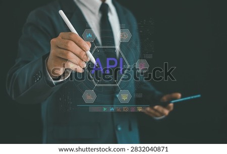 Business professional developing cloud API integration for digital transformation, software connectivity, data synchronization, enterprise applications, workflow automation, and business analytics.