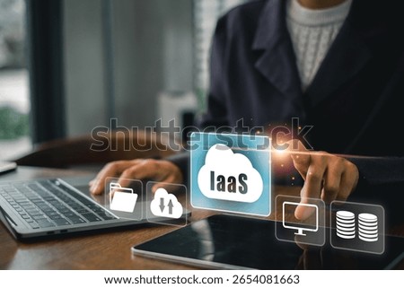 Business professional interacts with IaaS cloud interface, showcasing modern technology in a contemporary office environment.