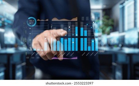 A business professional interacts with a transparent digital interface that displays various data analytics and graphs in a modern office setting, highlighting technology's role in business. - Powered by Shutterstock