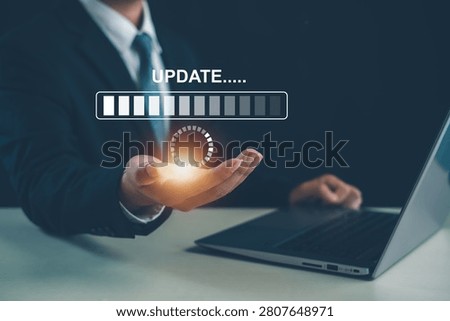 Business professional managing software updates and system upgrades on a digital platform, highlighting technology maintenance, cybersecurity patches, performance optimization, and IT management.
