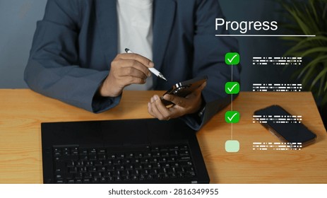 Business professional tracking progress and completing digital tasks on a smartphone, with checklist icons, laptop, and workspace representing productivity, project management, workflow, and successful goal achievement.