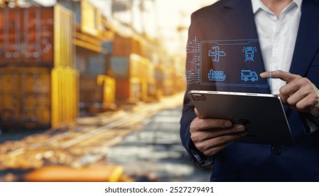 A business professional uses a tablet to enhance logistics management, showcasing digital tools and icons relevant to transport and supply chain operations. - Powered by Shutterstock