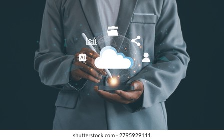 Business professional using cloud computing technology with AI, data analytics, file management, digital transformation, cybersecurity, and global network connectivity solutions.