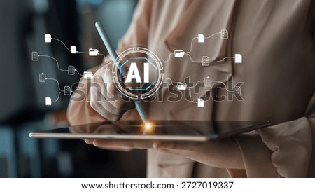 Business professional using digital tablet to interact with artificial intelligence framework and data connections in modern office environment Quark.