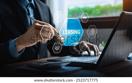 Business Professional Utilizing Digital Touchscreen for Leasing and Financial Analysis with Icons for Property, Car, and Contract Management and Investment Planning, Financial Agreements