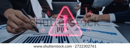 Business professionals engage in a collaborative analysis of various reports, highlighting critical warnings and alerts in a modern office setting to ensure informed decision-making. Trope