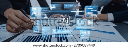 Business professionals engage in data analysis using an advanced interface showcasing artificial intelligence technology to drive informed decision-making. Trope