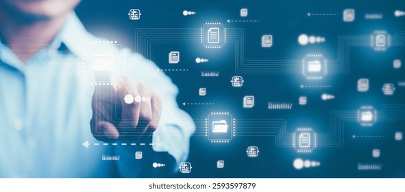 Business professionals are managing files and folders that store corporate data digitally. By connecting paperless technology online on database, internet using software and cloud,