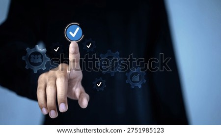 Business quality assurance and process optimization concept showing hand selecting approval checkmark with business management icons, representing performance improvement, workflow management and operational efficiency.