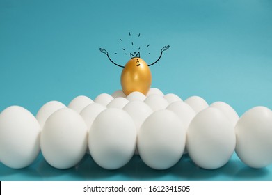 Business Recruitment, Talent Management. One Golden Egg With Crown In Top Of White Eggs Group On Blue Background. 