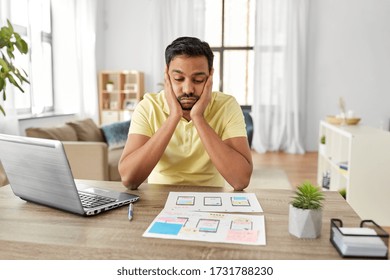 Business, Remote Job And Technology Concept - Bored Or Upset Indian Man Or Ui Designer With Laptop Computer Working On User Interface Design At Home Office