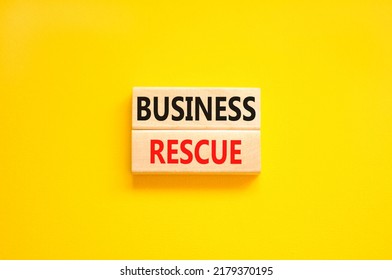 Business Rescue Symbol. Concept Words Business Rescue On Wooden Blocks On A Beautiful Yellow Table Yellow Background. Business Rescue And Support Concept. Copy Space.