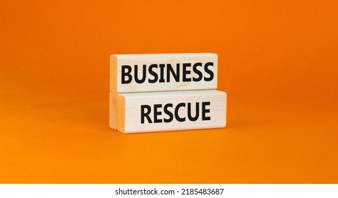 Business Rescue Symbol. Concept Words Business Rescue On Wooden Blocks On A Beautiful Orange Table Orange Background. Business Rescue And Support Concept. Copy Space.