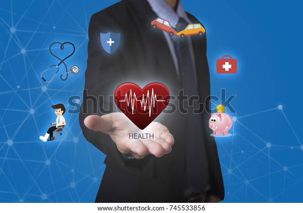 business salesman agent hand holding\
accident assurance health-care insurance\
concept.