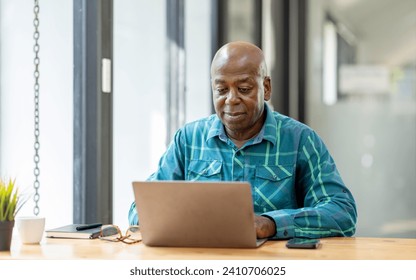 Business senior man 60 years old using laptop computer and thinking about question in office. Happy middle aged man, entrepreneur, small business owner working online. - Powered by Shutterstock