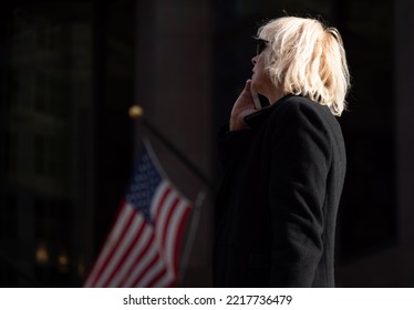 Business Senior Woman Speaking Mobile Phone Go To Office Outdoors. Serious Businessperson Using Smartphone Digital App Device Answering Call Walking Calling On City Street