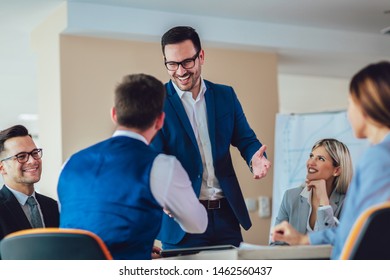 Business shaking hand with a client in office  - Shutterstock ID 1462560437