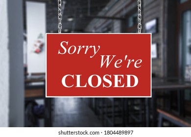 A business sign that says â€˜Sorry, We're Closedâ€™ on cafe/restaurant window. - Shutterstock ID 1804489897