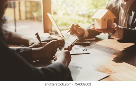 Business Signing A Contract Buy - Sell House.