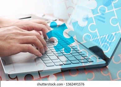 Business solution concept. Businessman analyzing data and finding solution.Laptop and jigsaw puzzle pieces icon.